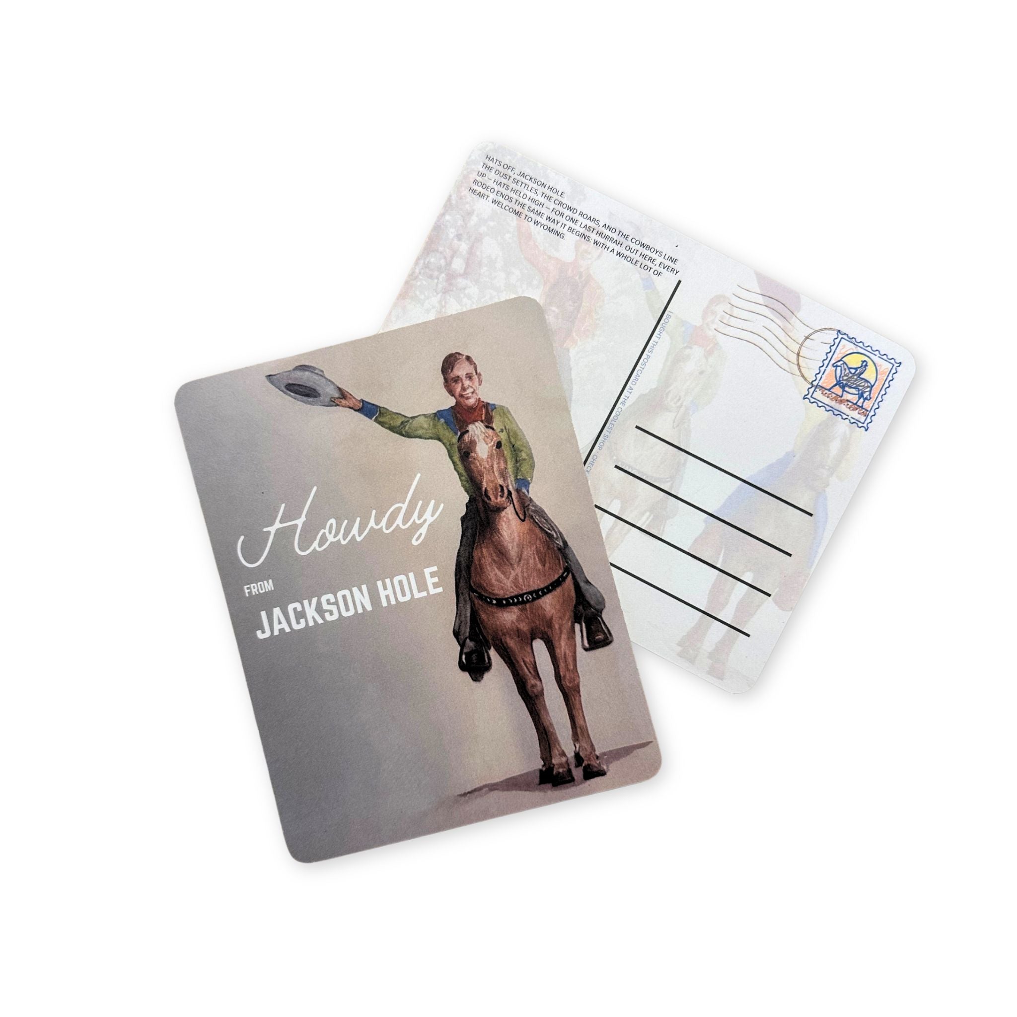 A postcard of a young cowboy on a horse, waving his hat. Text reads "Howdy from Jackson Hole"