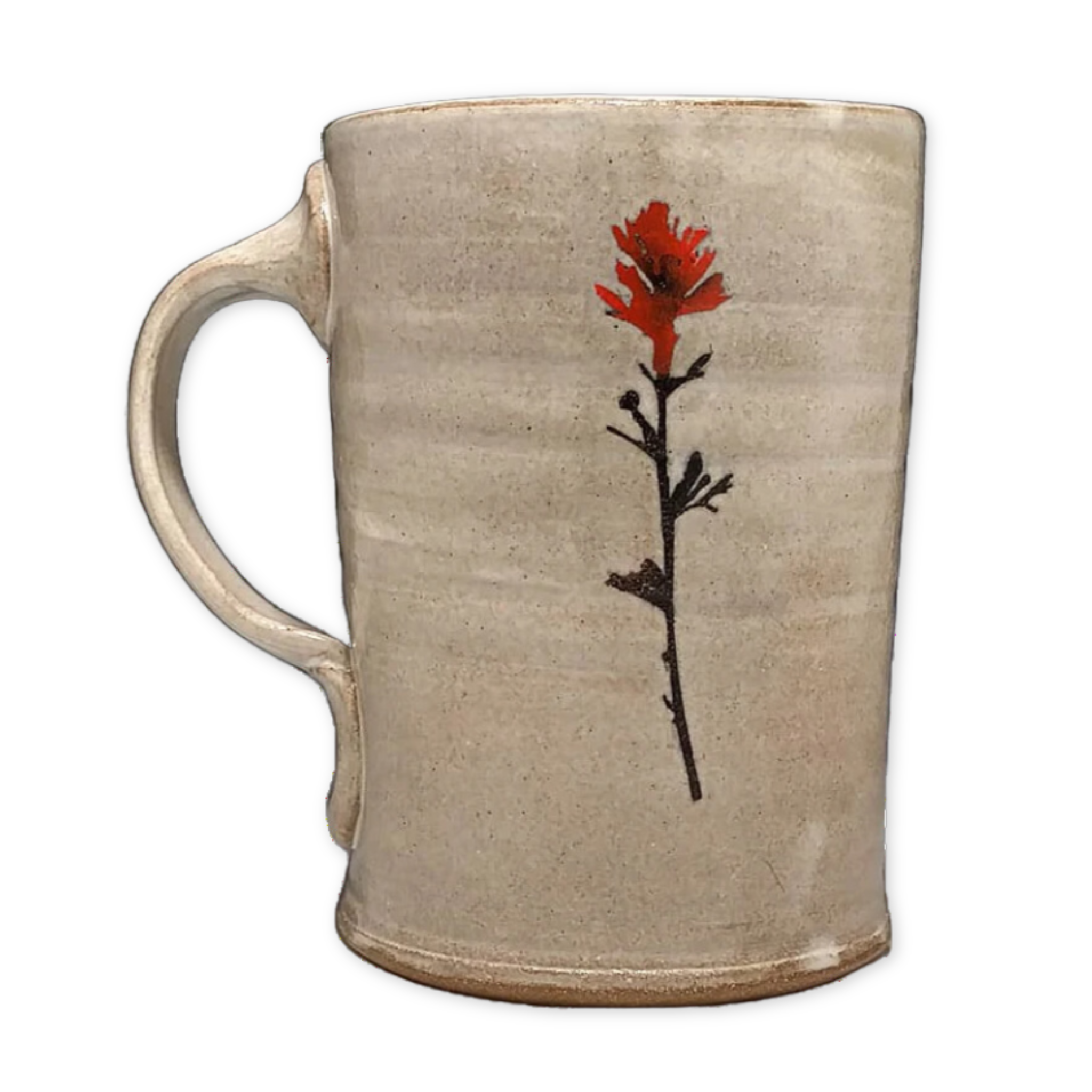 cream colored ceramic mug with an indian paintbrush design