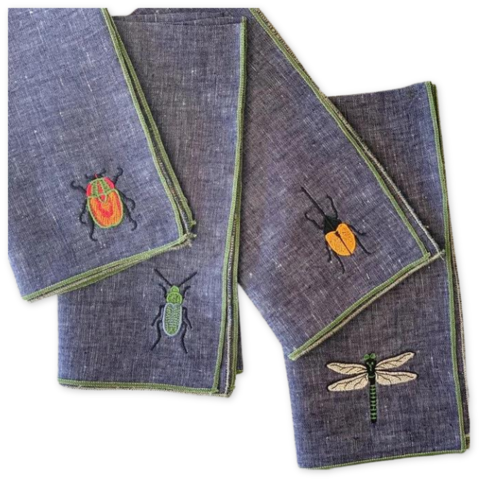 set of four linen everyday napkins with green hems and an insect embroidered in the bottom corner