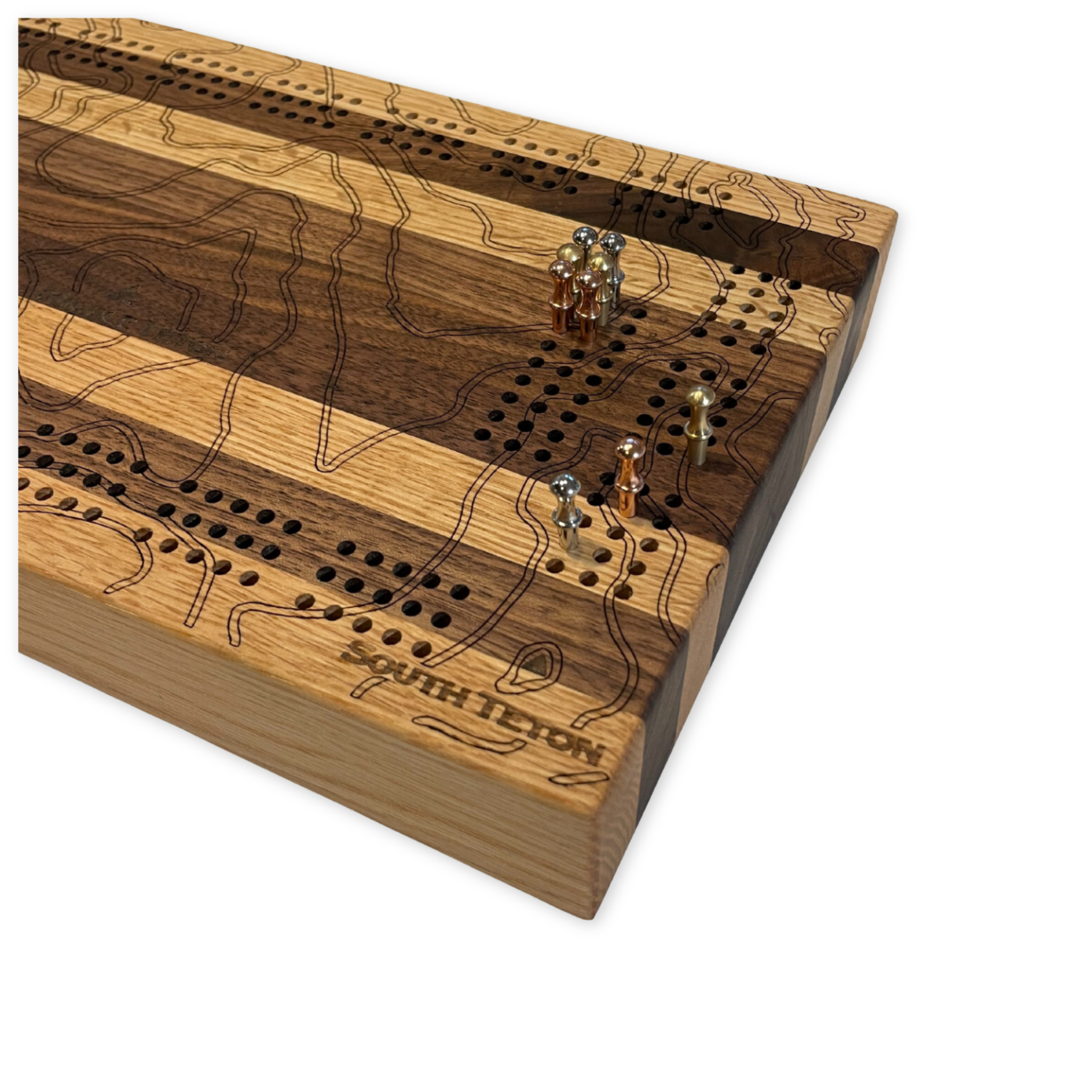 handcrafted wooden cribbage board featuring a design with a topographic map of the teton mountain range