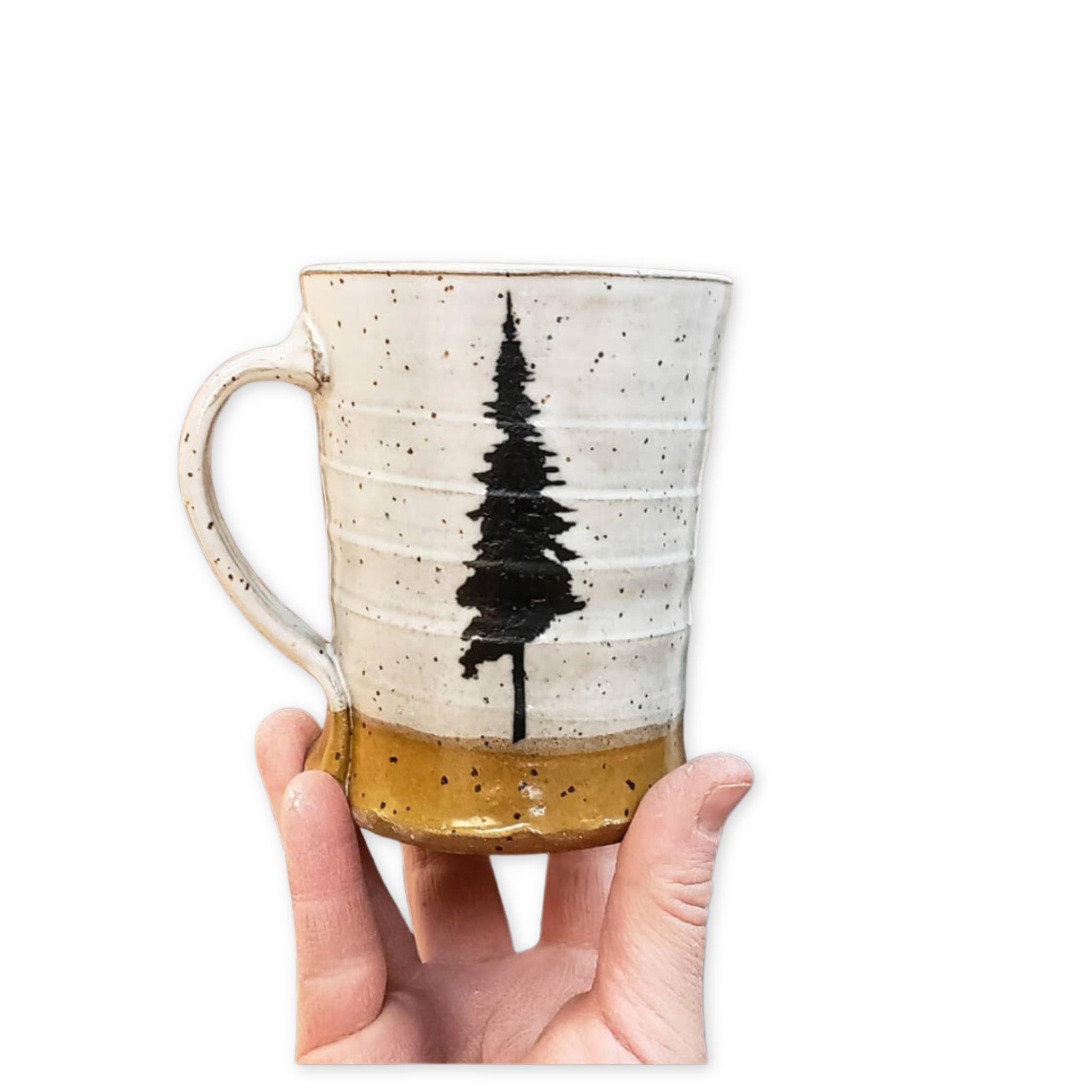 cream speckled ceramic mug with an image of a single pine tree