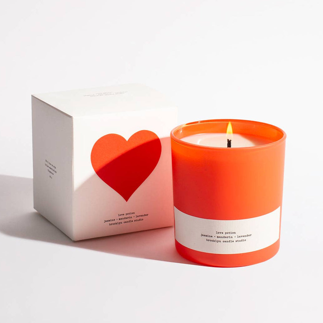 Red candle with heart box