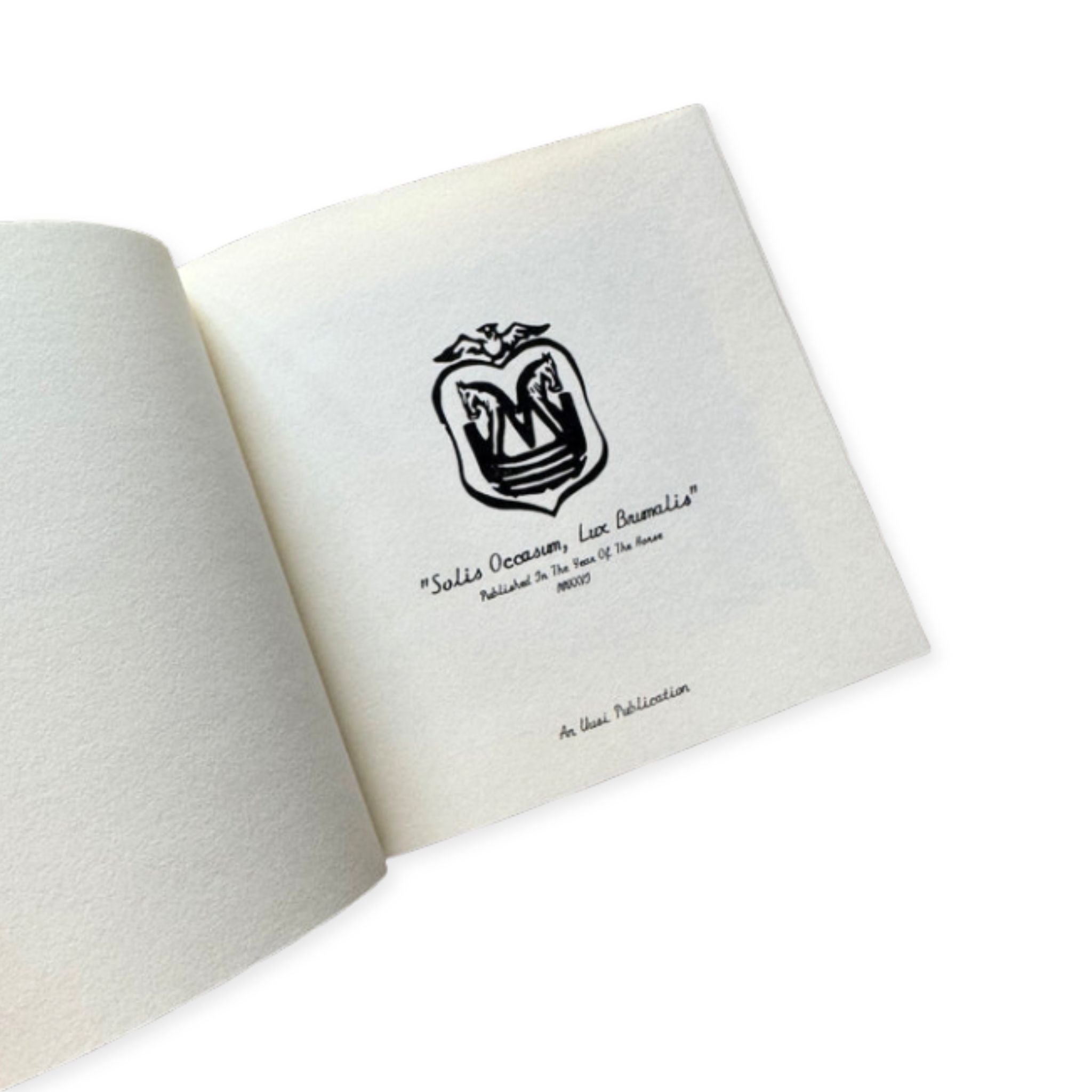 Open book with a black logo and text on white pages