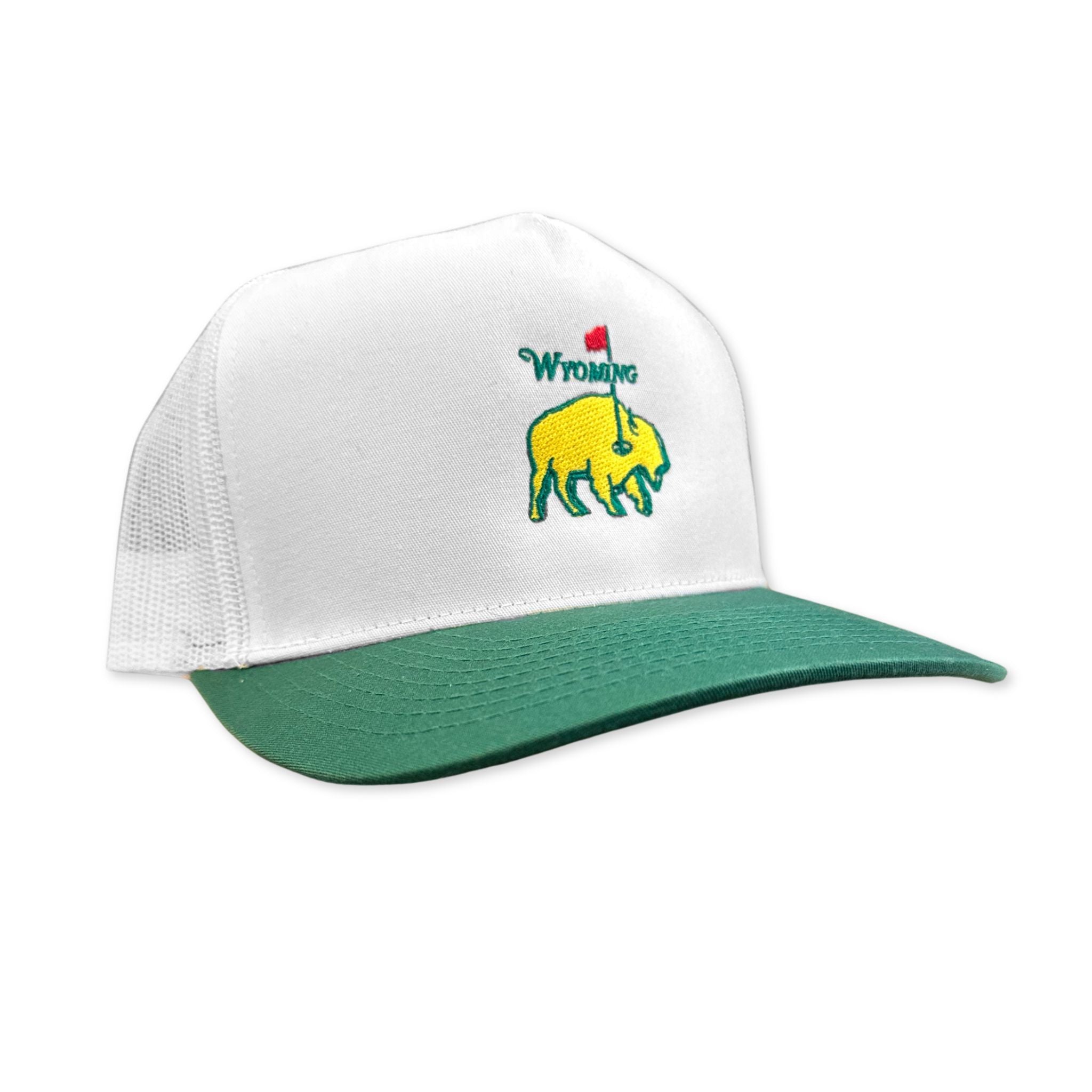 White and green cap with a logo of a buffalo and 'Wyoming' text on a white background