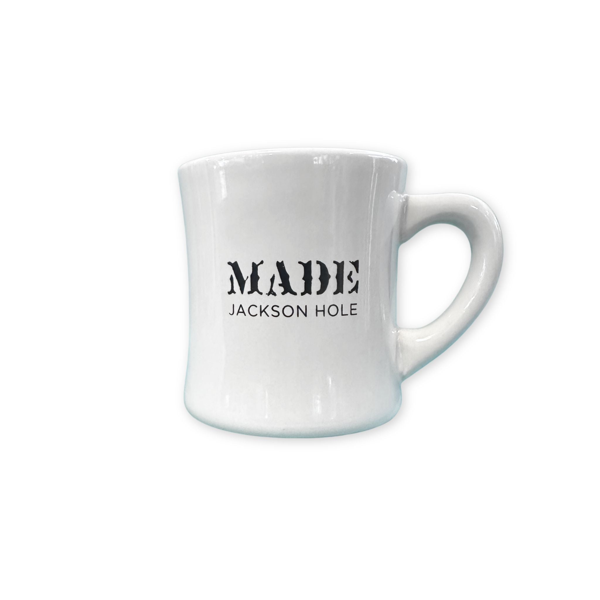 A diner style mug featuring the MADE Jackson Hole logo, in bold lettering. Colors are black and white. 