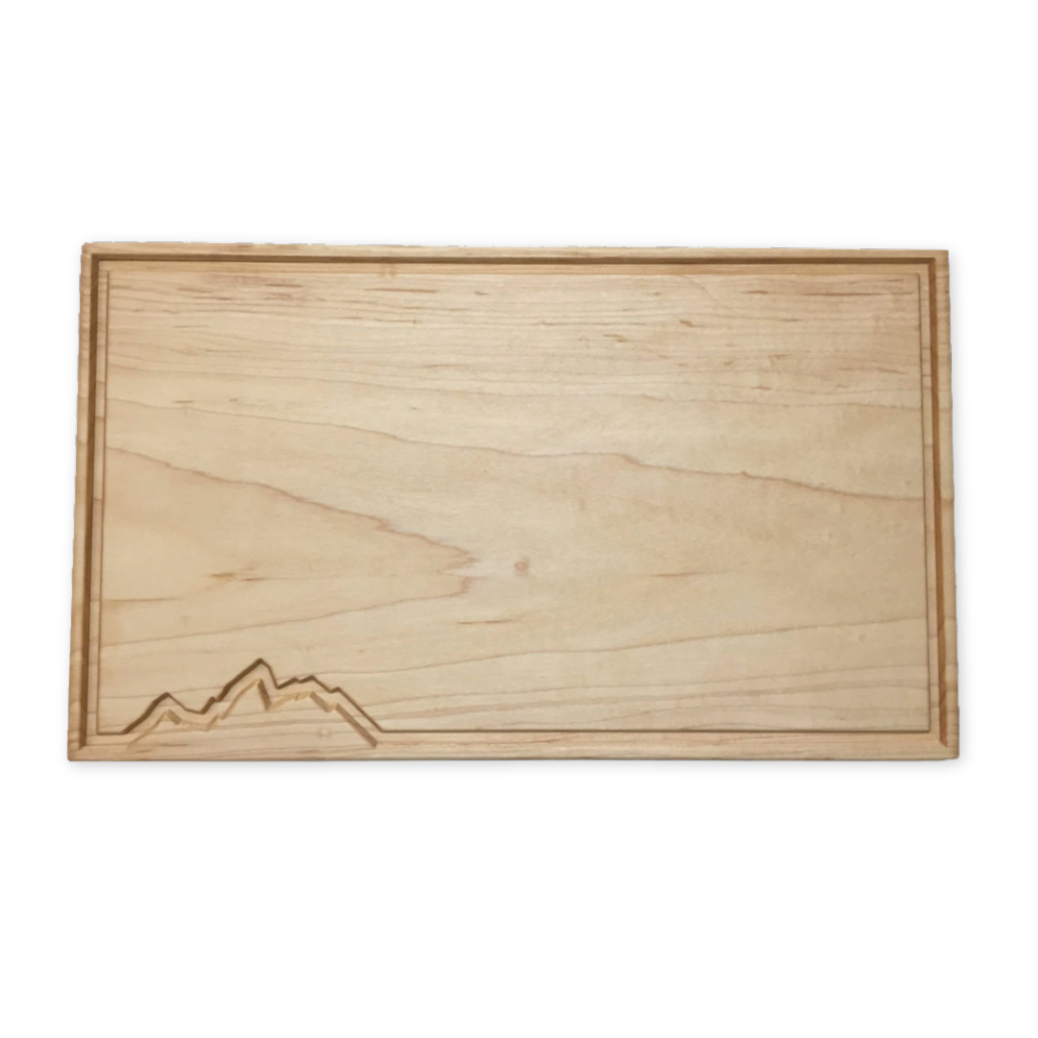 maple cutting board with subtle engraved teton design