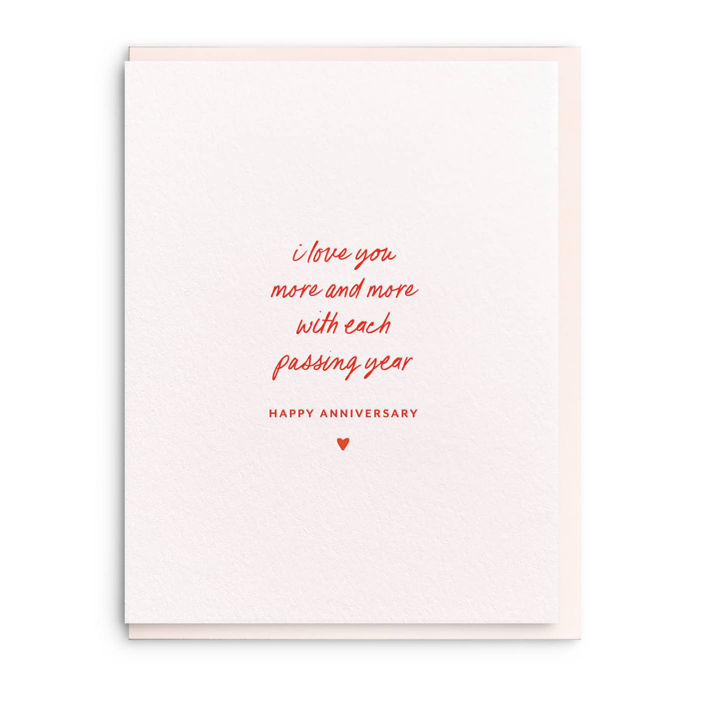 Greeting card with red text 'I love you more and more with each passing year. Happy Anniversary' on a white background