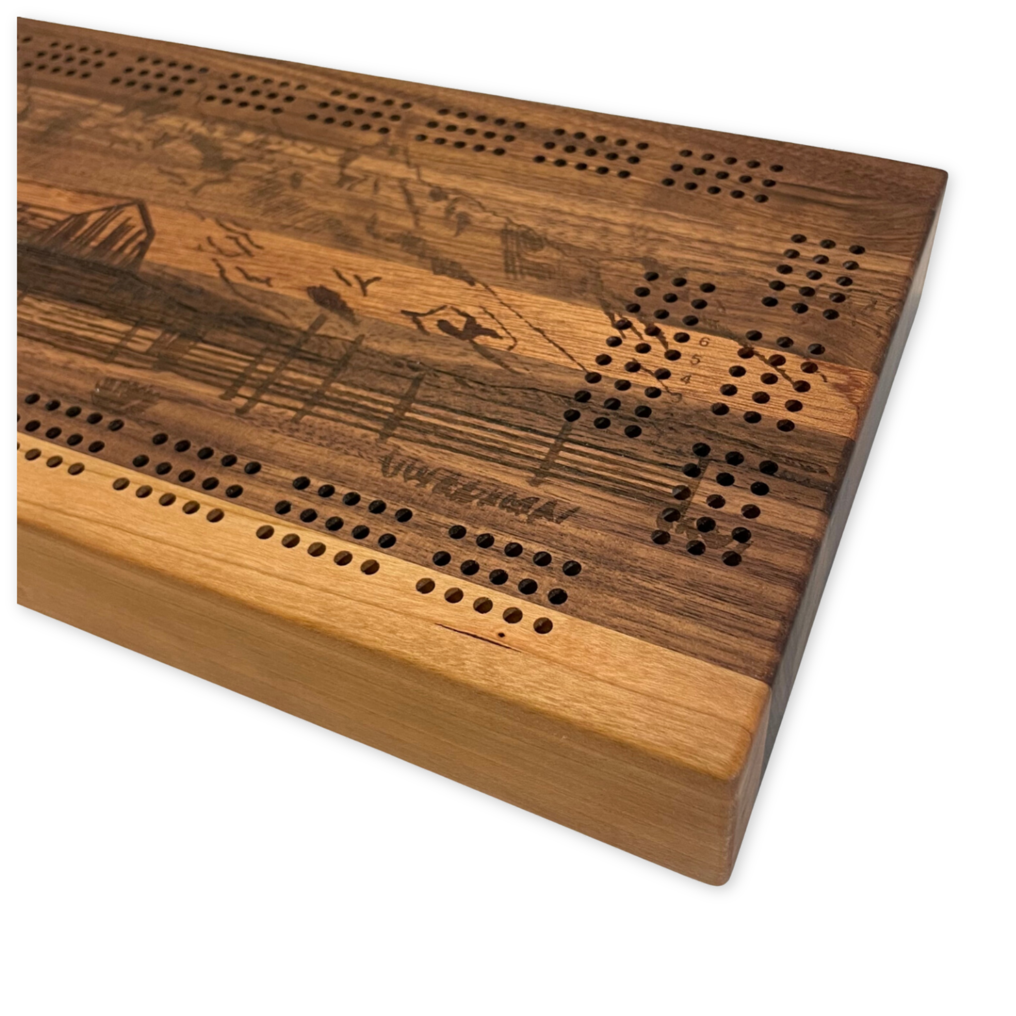 handcrafted wooden cribbage board featuring  a design depicting mormon row in jackson hole