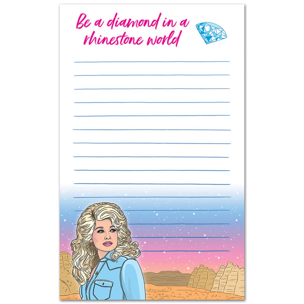 Notepad with a desert scene, woman's portrait, and motivational quote on a white background