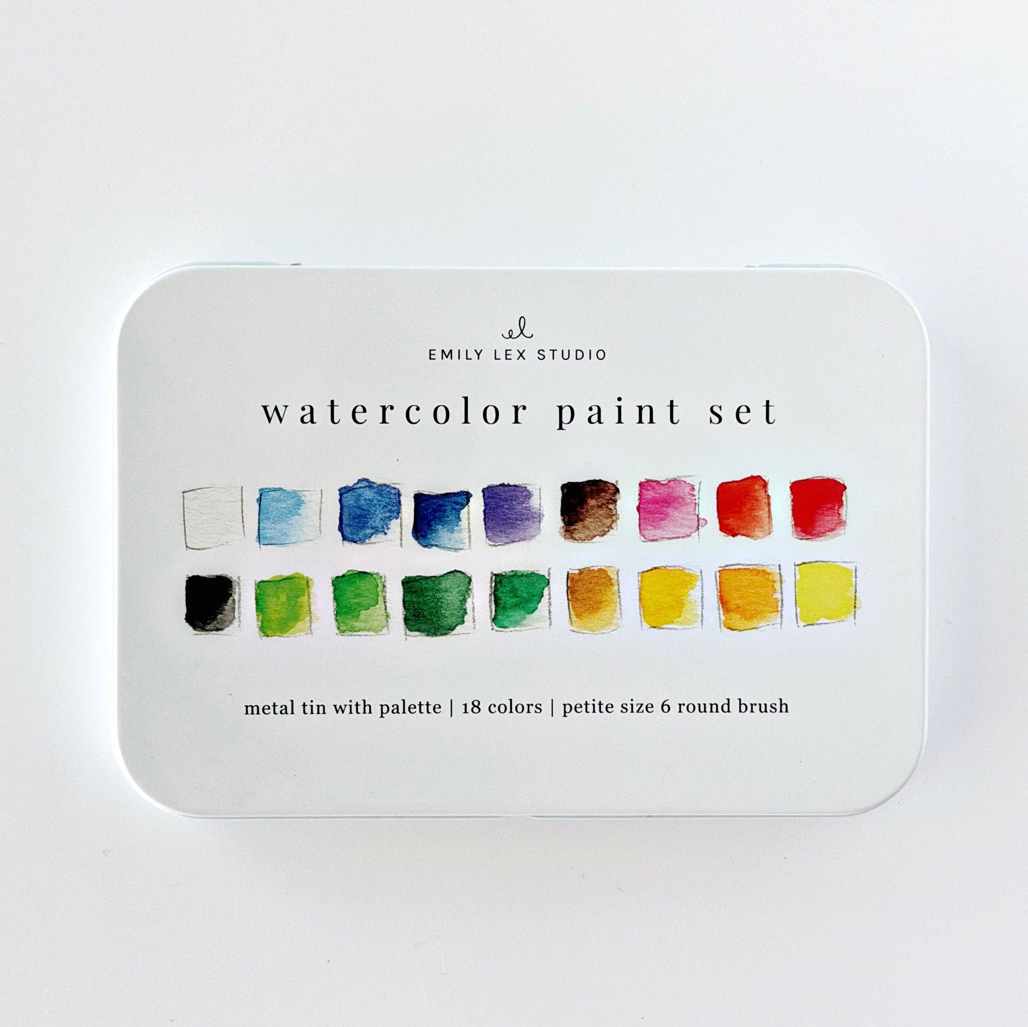 Watercolor paint set with color swatches.