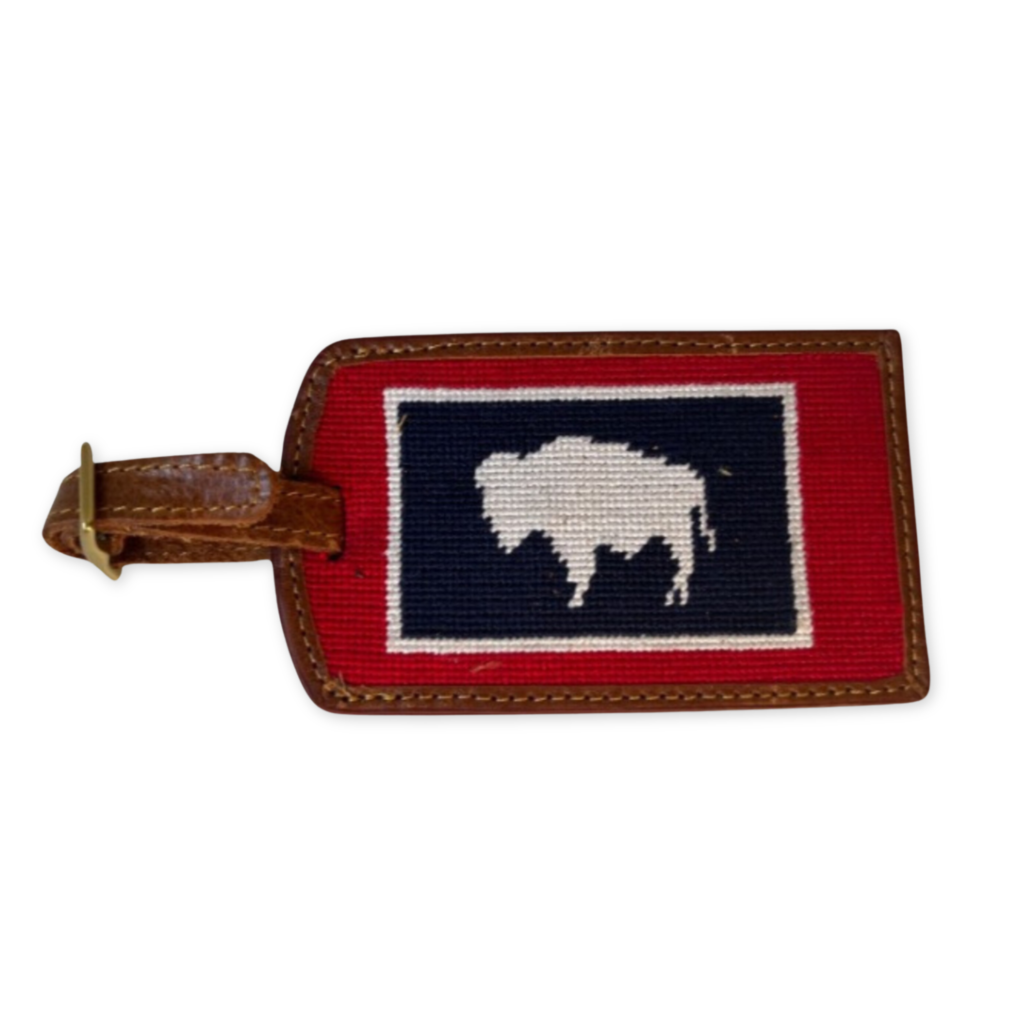 hand stitched needlepoint luggage tag with a wyoming flag design