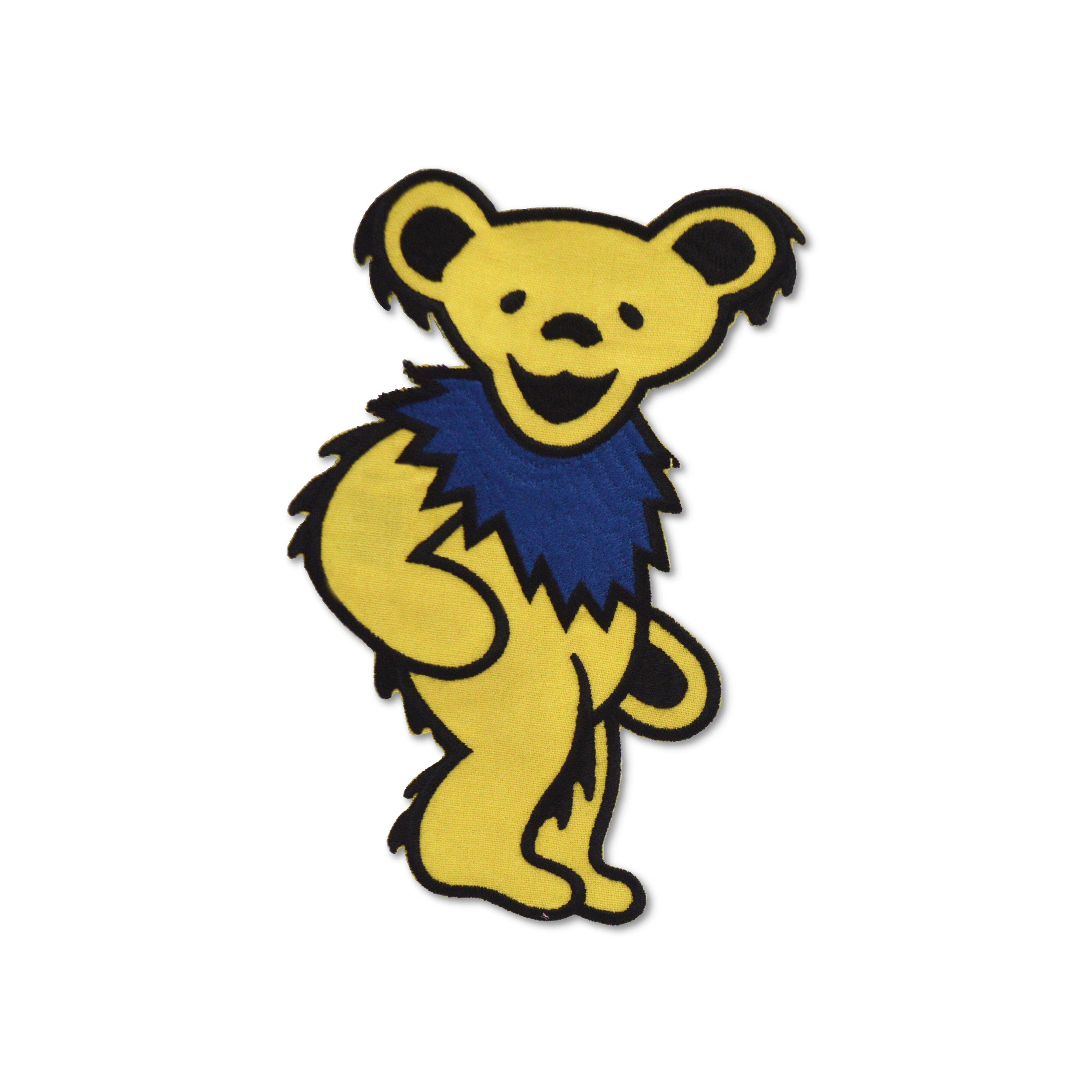 Yellow bear with blue collar on a white background