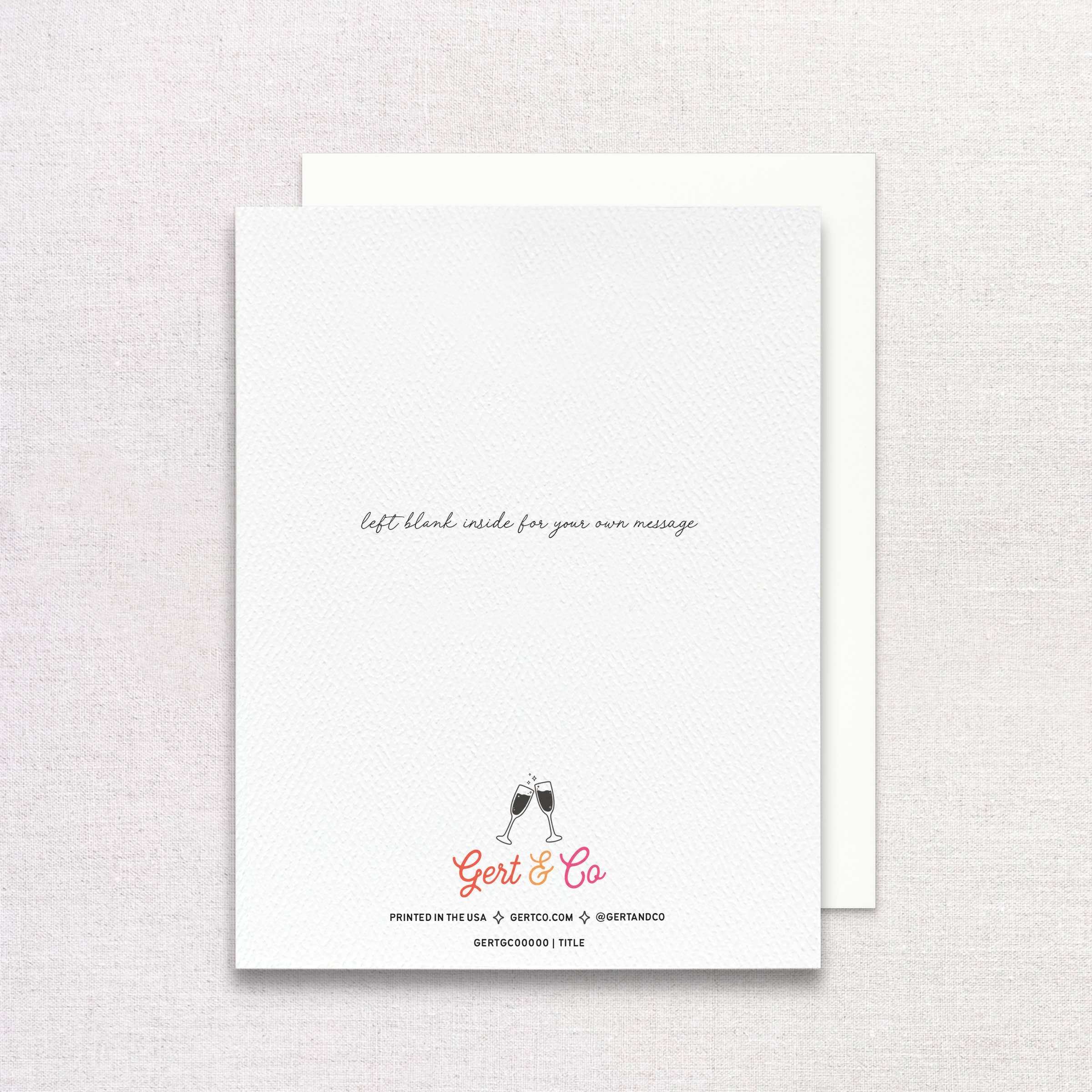 Greeting card with champagne glass design and 'Geri & Co' branding on a textured white surface.