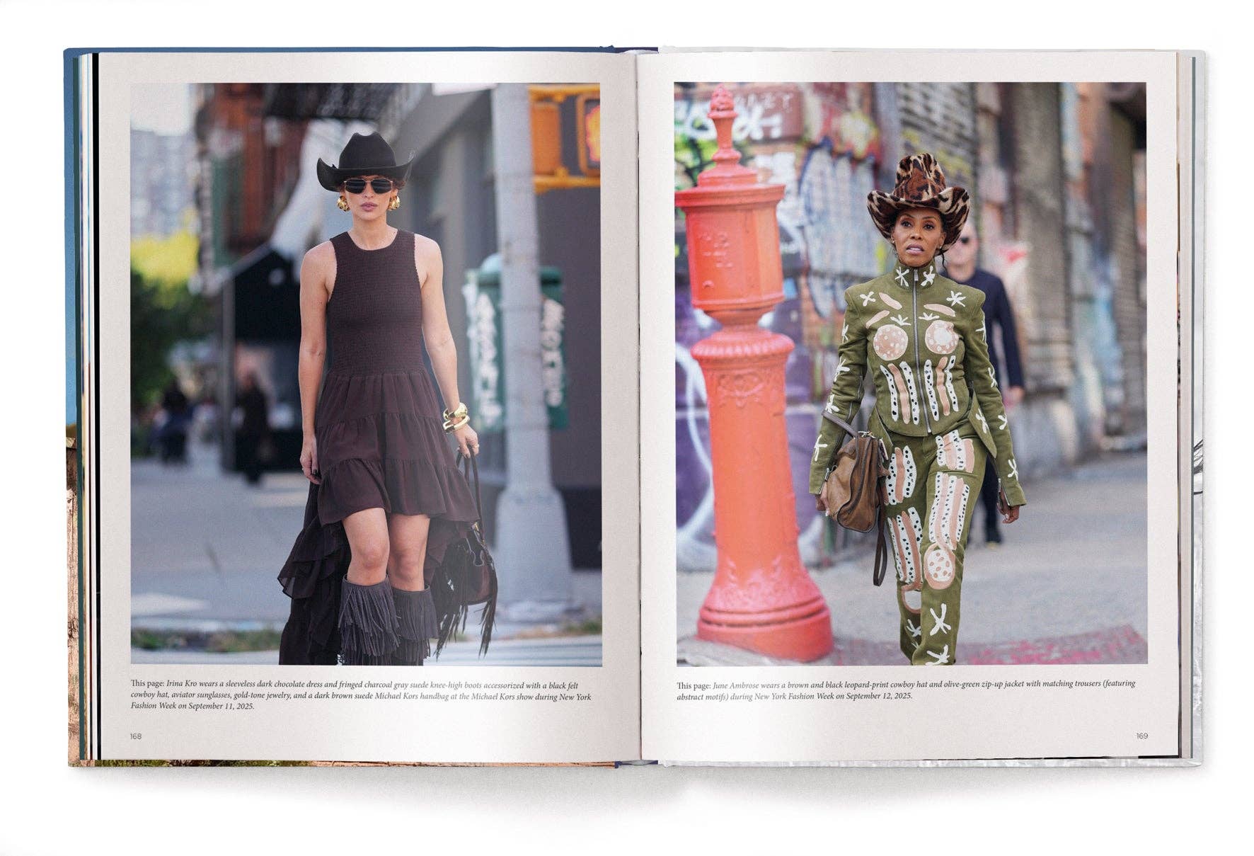 Open book showing two people on a city street, one in a black dress and hat, the other in a green outfit with patterns.