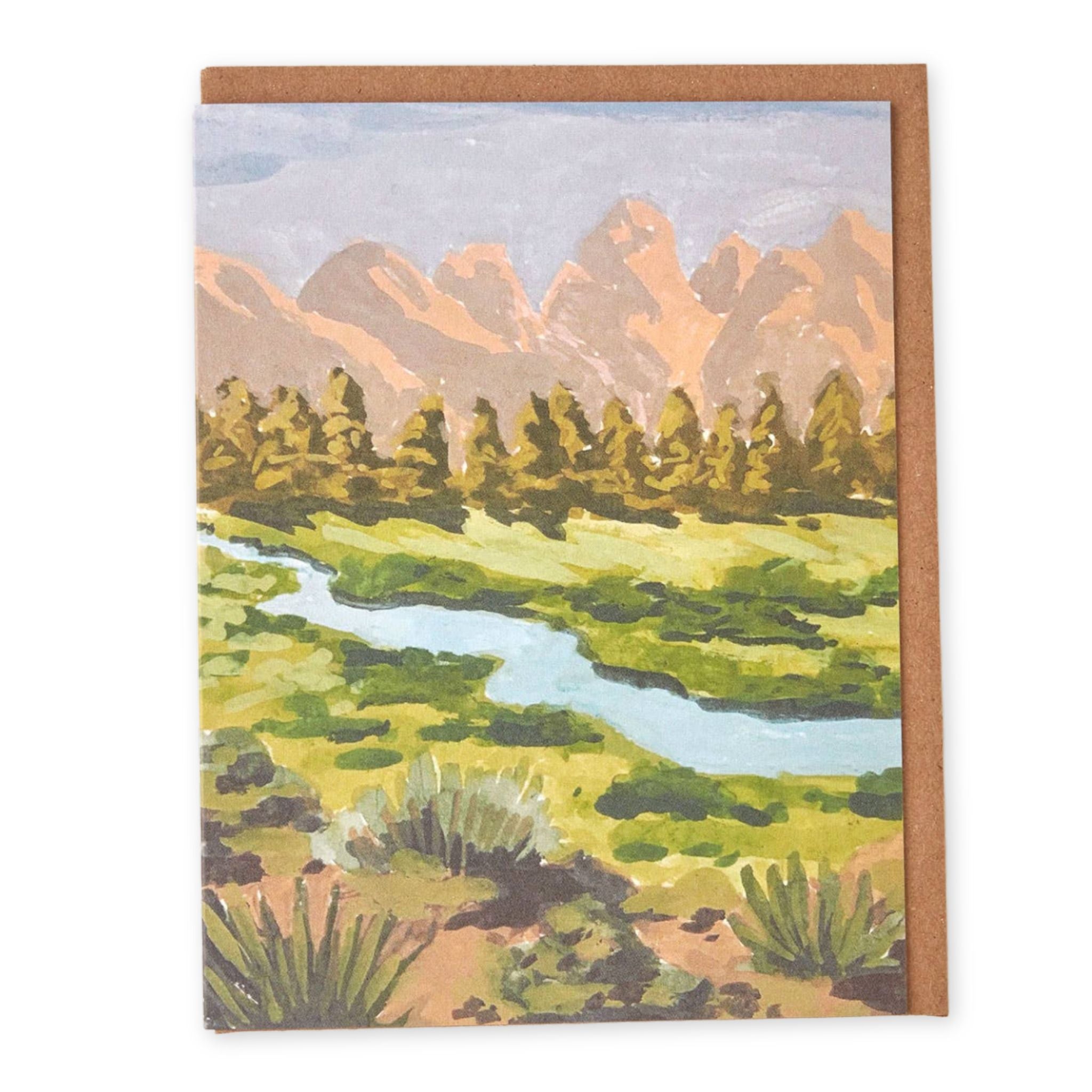 Greeting card with a painting of a mountain landscape with trees and a river.