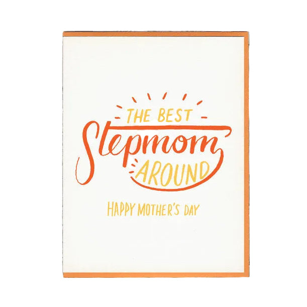 A greeting card with a white background, orange text that reads 'THE BEST STEPMOMA AROUND' with a smaller text that reads 'HAPPY MOTHER'S DAY', displayed against a brick wall background.