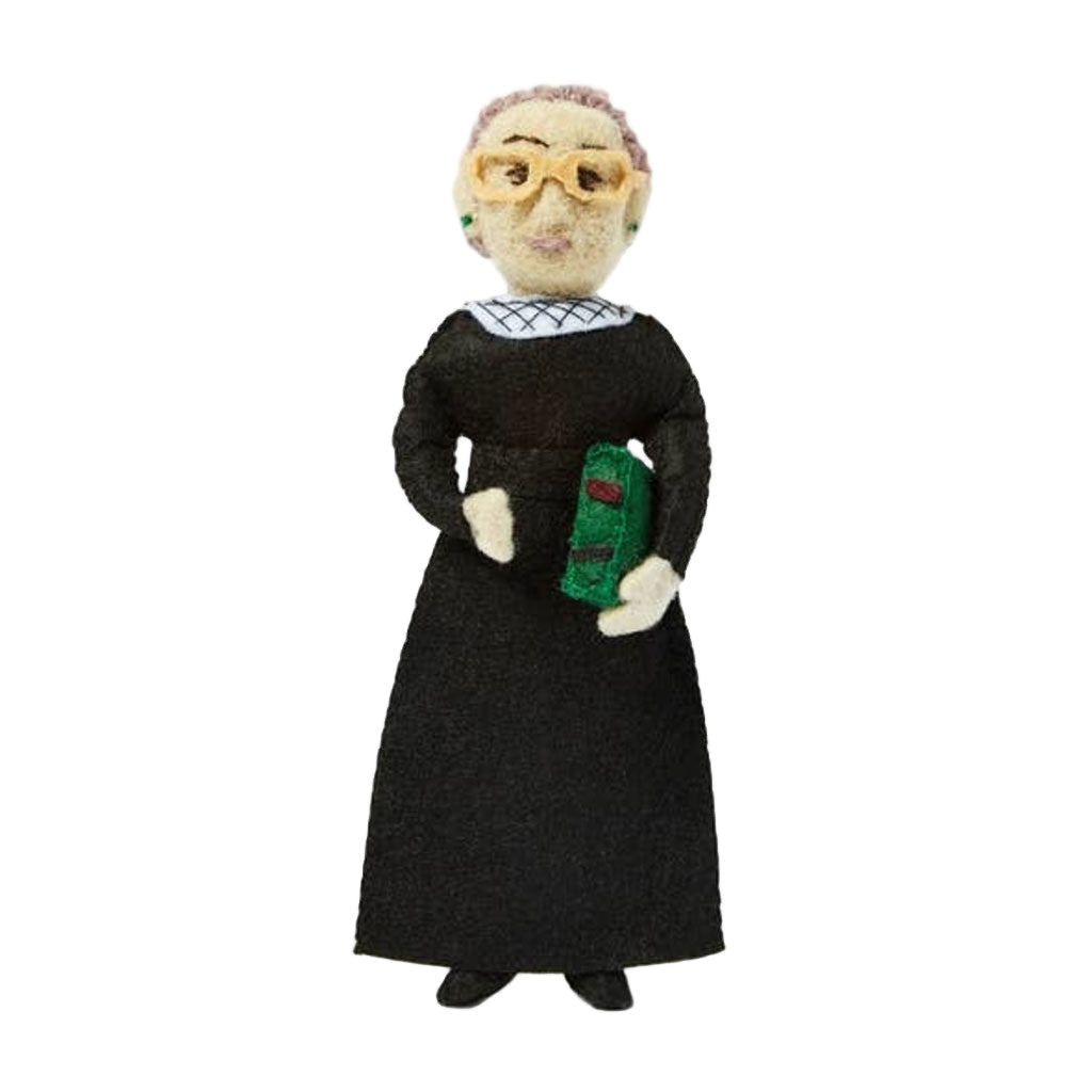 Handmade wool ornament in the likeness of Ruth Bader Ginsburg, featuring a figure wearing a black robe and holding a green book.